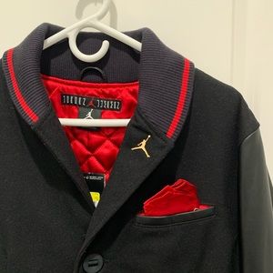 2012 Nike Air Jordan Brand XI Bred Step’N jacket.